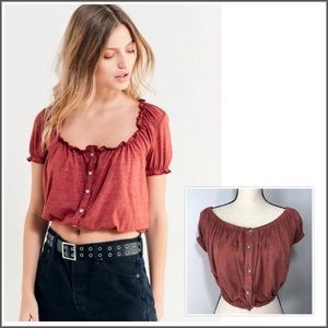 Cropped rust red terra-cotta ruffle button top